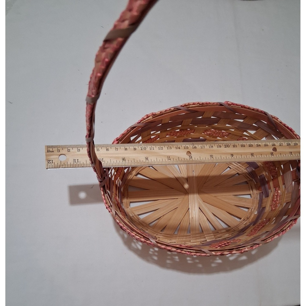 Two vintage woven bamboo baskets with‎ tall handles and pink accenting. - Picture 7 of 9